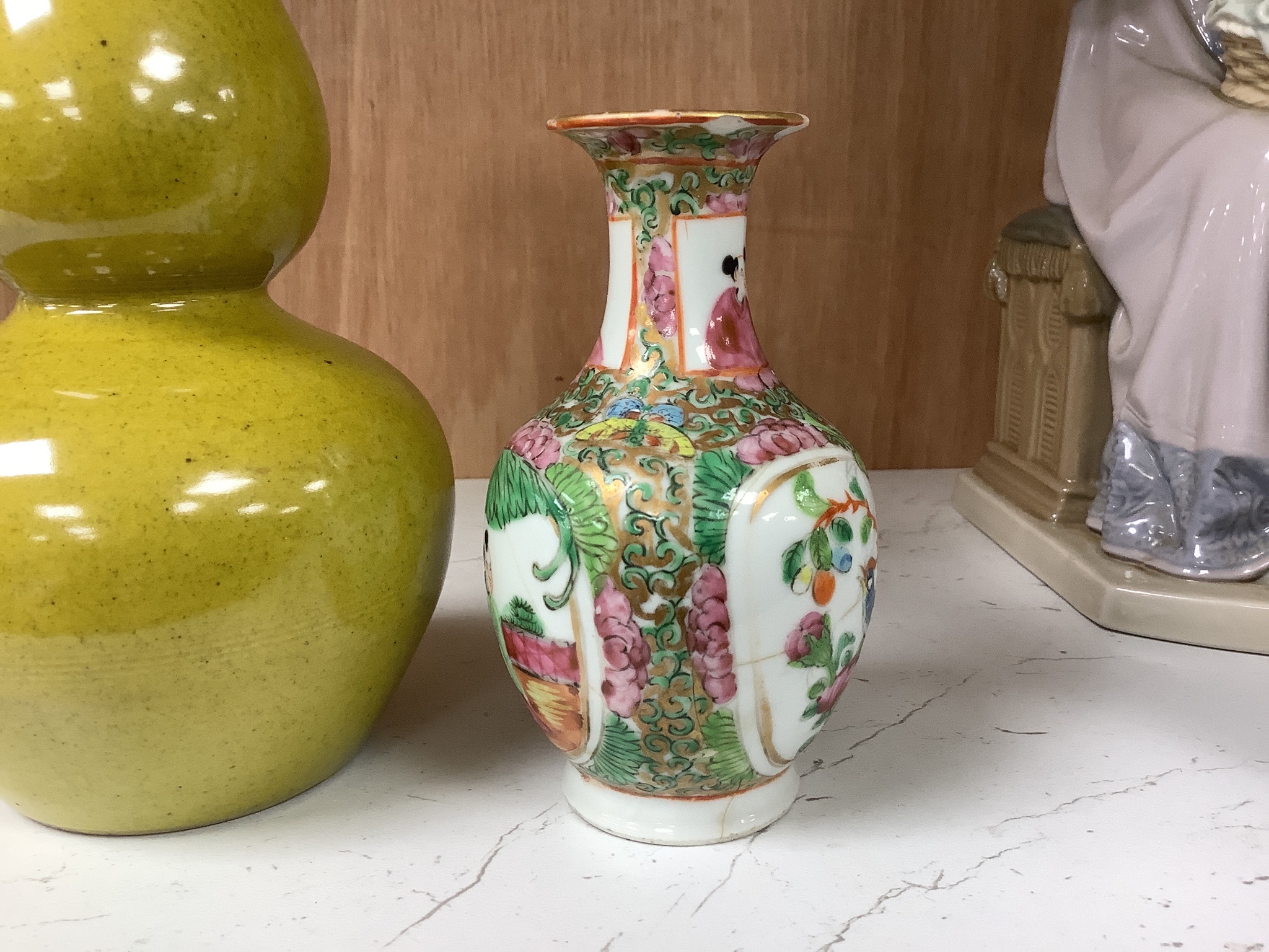 A Chinese yellow ground double gourd vase and a similar famille rose baluster vase, tallest 18cm